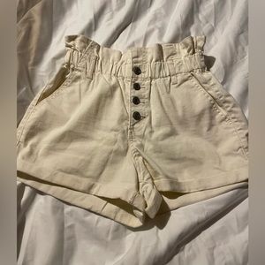 Women’s size 7 cream colored jean shorts